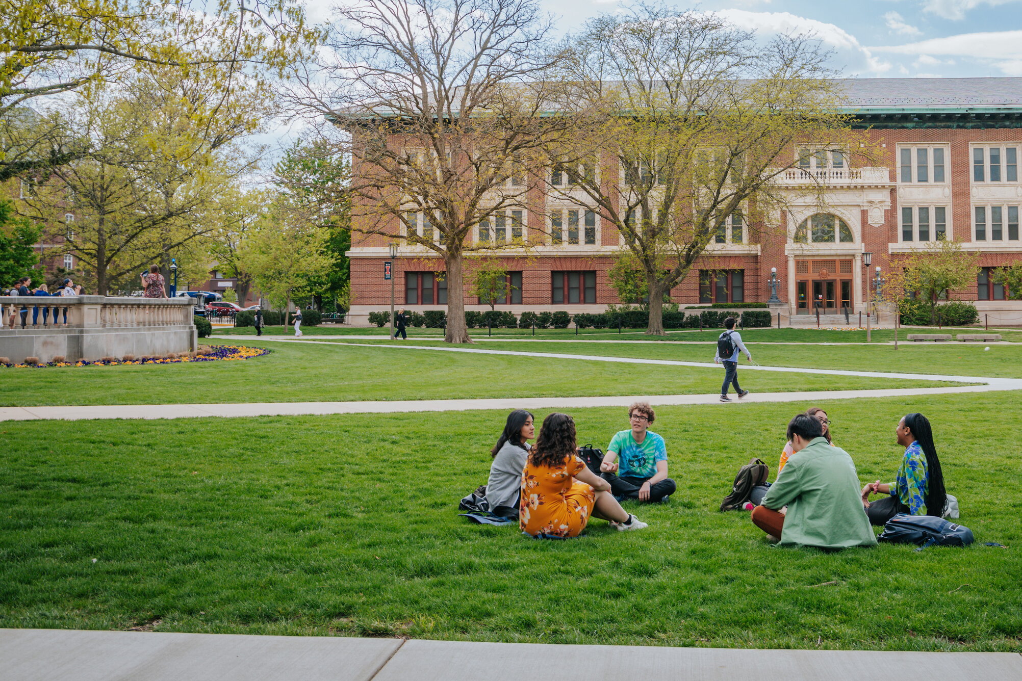students sitting on the quad