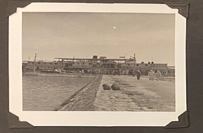 Nile steamer docks at the village of El Hiba on the west bank of the Nile River, Upper Egypt